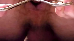 Garden hose enema coupled with anal stretching